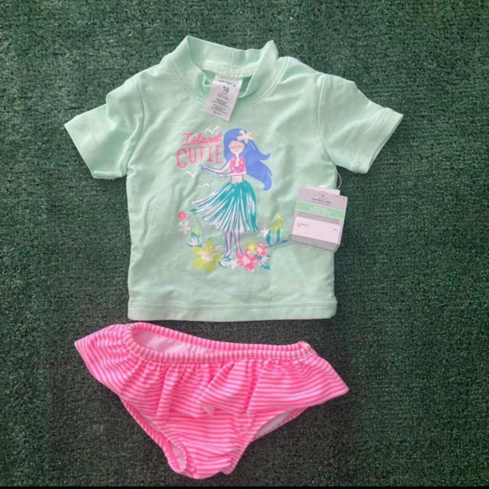 Carter’s 2 piece swim wear baby girls. Ruffle bottom.